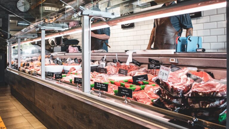 Selection of meats at a butchers counter