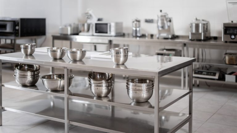 Commercial stainless steel tables with shelves